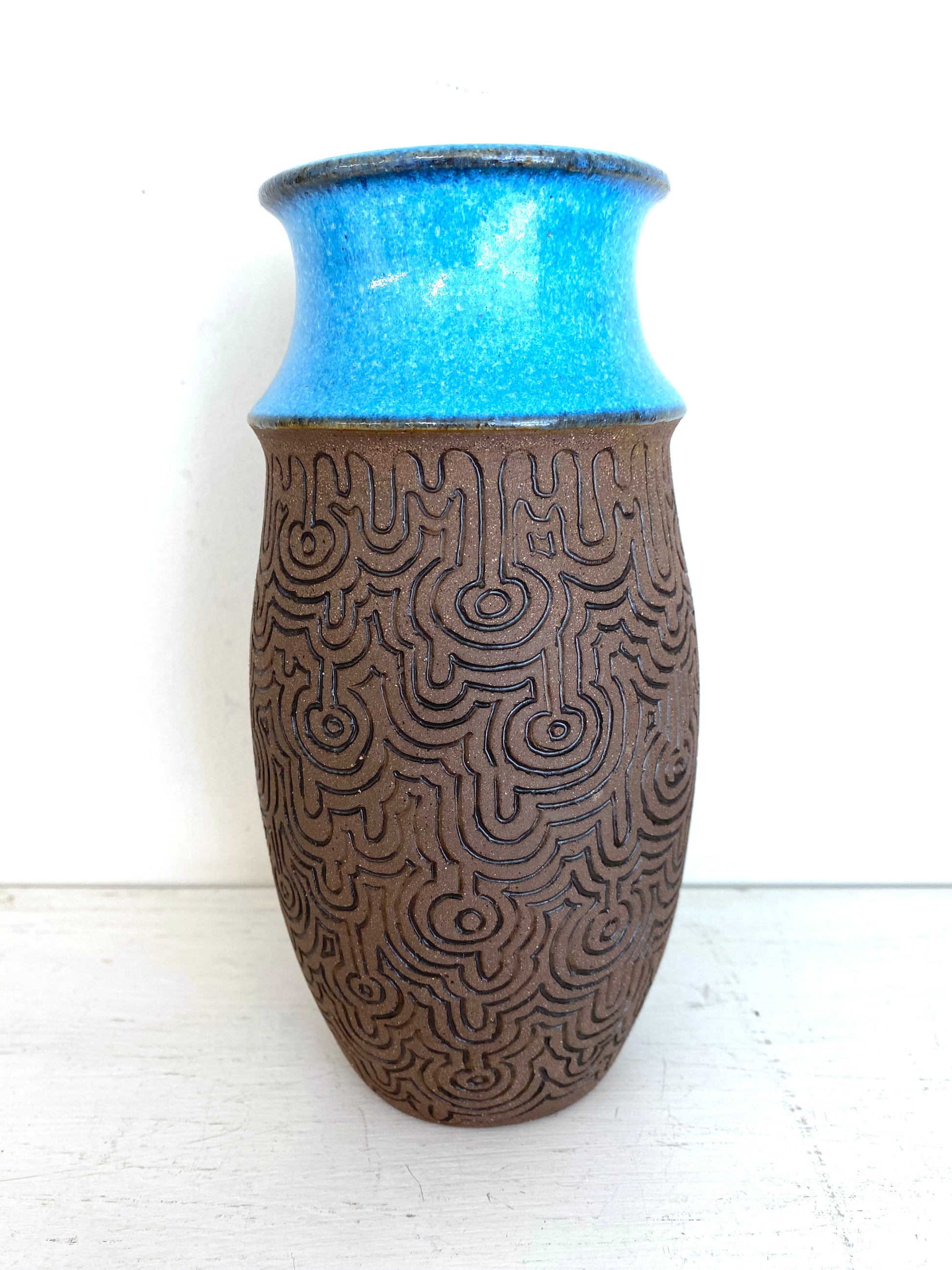 Rice terrace patterned turquoise topped vase  20cms