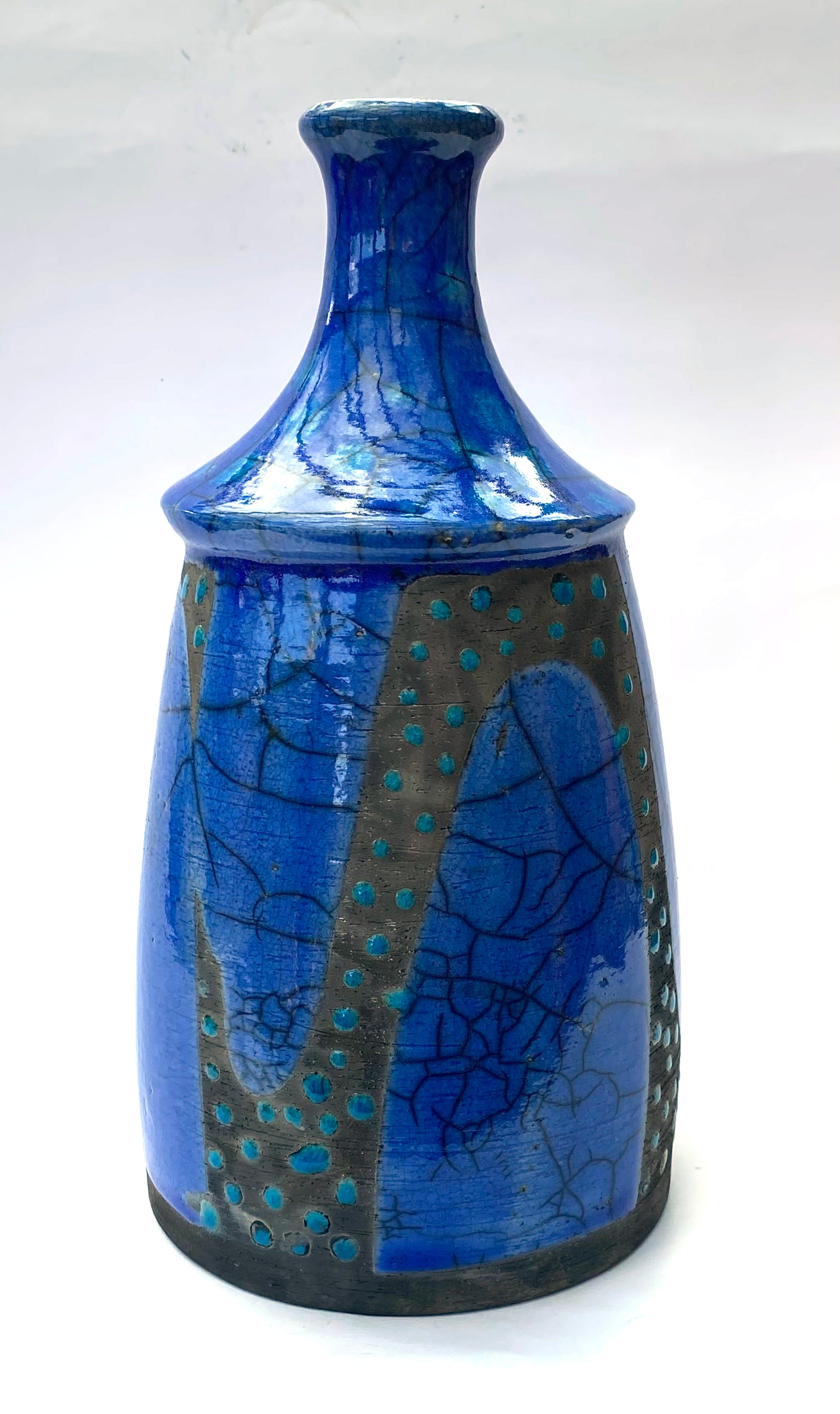 Deep blue dripped and spotted bottle form