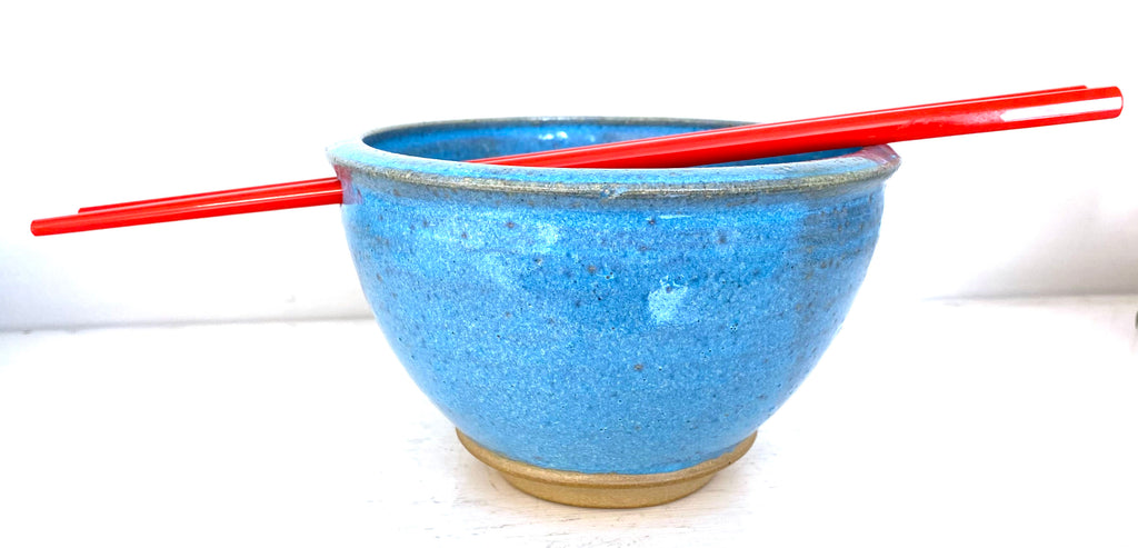 Ramen bowls with chopsticks